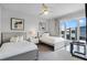Bedroom with two twin beds and window views at 7770 Sandy Ridge Dr # 208, Reunion, FL 34747
