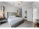 Spacious bedroom with king-size bed and large window at 7770 Sandy Ridge Dr # 208, Reunion, FL 34747
