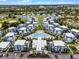 Aerial view of the community with landscape and pool at 7770 Sandy Ridge Dr # 208, Reunion, FL 34747