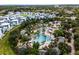 Aerial view of community pool and resort-style amenities at 7770 Sandy Ridge Dr # 208, Reunion, FL 34747