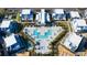 Aerial view of community with pool and buildings at 7770 Sandy Ridge Dr # 208, Reunion, FL 34747