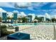 Relax by the community pool with a fountain and plenty of seating at 7770 Sandy Ridge Dr # 208, Reunion, FL 34747