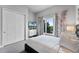 Cozy bedroom with queen-size bed and view at 7770 Sandy Ridge Dr # 208, Reunion, FL 34747