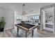 Game room featuring a pool table and access to a bedroom at 7770 Sandy Ridge Dr # 208, Reunion, FL 34747