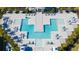 Resort-style pool with spacious deck and lounge chairs at 7770 Sandy Ridge Dr # 208, Reunion, FL 34747