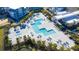 Aerial view showing community pool and buildings at 7770 Sandy Ridge Dr # 208, Reunion, FL 34747