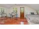 Spacious bedroom with wood floors and ample natural light from large windows at 5006 Cub Lake Dr, Apopka, FL 32703