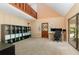 Bright home office features built-in shelving, workspace, and access to a private patio at 5006 Cub Lake Dr, Apopka, FL 32703
