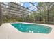 Enclosed pool area with ample space for relaxing at 5006 Cub Lake Dr, Apopka, FL 32703