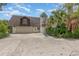 Long driveway with a basketball court and ample parking space at 5006 Cub Lake Dr, Apopka, FL 32703