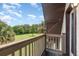 Private balcony overlooking a lush green backyard at 5006 Cub Lake Dr, Apopka, FL 32703