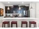 Modern kitchen with stainless steel appliances and a large island at 1224 Challenge Dr, Davenport, FL 33896