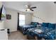 Themed bedroom with two twin beds and space-themed decor at 1224 Challenge Dr, Davenport, FL 33896