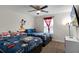 Themed bedroom with two twin beds and Mickey Mouse decor at 1224 Challenge Dr, Davenport, FL 33896