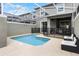 Private screened pool with patio furniture and grill at 1224 Challenge Dr, Davenport, FL 33896