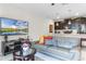 Living room with modern decor and large TV at 1224 Challenge Dr, Davenport, FL 33896
