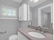 Updated bathroom features a vanity with sink, and a shower at 3605 Pershing Ave, Orlando, FL 32812