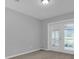 Bedroom with French doors leading to a patio at 3605 Pershing Ave, Orlando, FL 32812