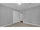 Well-lit bedroom with neutral walls and carpet flooring at 3605 Pershing Ave, Orlando, FL 32812