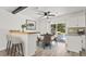 Casual dining area with wood-look floors and view of the backyard at 1801 James St, South Daytona, FL 32119