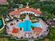 Aerial view of community pool, tennis courts, and cabanas at 801 Lobelia Dr, Lake Mary, FL 32746
