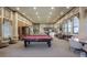 Community room with billiard table and seating at 801 Lobelia Dr, Lake Mary, FL 32746
