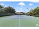 Community tennis court with green surface at 801 Lobelia Dr, Lake Mary, FL 32746