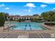 Relaxing community pool with plenty of lounge chairs at 801 Lobelia Dr, Lake Mary, FL 32746