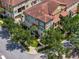 An aerial view of a townhouse community and surrounding landscape at 801 Lobelia Dr, Lake Mary, FL 32746