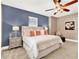 Spacious bedroom with king-size bed and neutral decor at 801 Lobelia Dr, Lake Mary, FL 32746