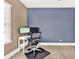 Home office with corner desk and two monitors at 801 Lobelia Dr, Lake Mary, FL 32746