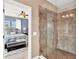 Walk-in shower with glass enclosure and tile at 801 Lobelia Dr, Lake Mary, FL 32746