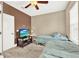 Guest bedroom with two twin beds and a flat-screen TV at 801 Lobelia Dr, Lake Mary, FL 32746