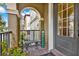 Inviting entryway with a tiled porch and bench at 801 Lobelia Dr, Lake Mary, FL 32746