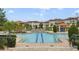 Resort-style community pool with lounge chairs at 801 Lobelia Dr, Lake Mary, FL 32746