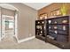 Spacious hallway with built-in shelving and access to other rooms at 801 Lobelia Dr, Lake Mary, FL 32746