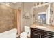 Bathroom with shower and tub, updated vanity, and tile at 801 Lobelia Dr, Lake Mary, FL 32746