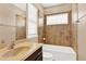Bathroom with tub, vanity, and tile at 801 Lobelia Dr, Lake Mary, FL 32746