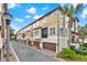 Townhouse community with garages and lush landscaping at 801 Lobelia Dr, Lake Mary, FL 32746
