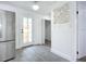 Clean and bright hallway with access to back yard at 1122 Lewis Dr, Daytona Beach, FL 32117