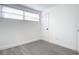 Bright bedroom with wood-look floors and window at 1122 Lewis Dr, Daytona Beach, FL 32117