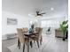 Bright dining area with seating for four and an open concept layout at 1122 Lewis Dr, Daytona Beach, FL 32117