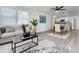 Open concept dining room with kitchen access and modern lighting at 1122 Lewis Dr, Daytona Beach, FL 32117