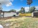 Backyard view, includes shed and fence at 1122 Lewis Dr, Daytona Beach, FL 32117