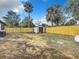 Backyard with shed and wooden fence at 1122 Lewis Dr, Daytona Beach, FL 32117