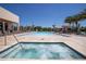 Relaxing pool and spa area with lounge chairs at 7527 Brooklyn Dr # 7527, Kissimmee, FL 34747