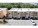 Aerial view of modern townhomes with ample parking at 7527 Brooklyn Dr # 7527, Kissimmee, FL 34747
