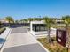 Gated community entrance with guardhouse and signage at 7527 Brooklyn Dr # 7527, Kissimmee, FL 34747