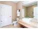 Modern bathroom with updated vanity, toilet, and shower at 7527 Brooklyn Dr # 7527, Kissimmee, FL 34747
