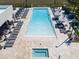 Relaxing pool and spa area with plenty of lounge chairs at 7527 Brooklyn Dr # 7527, Kissimmee, FL 34747